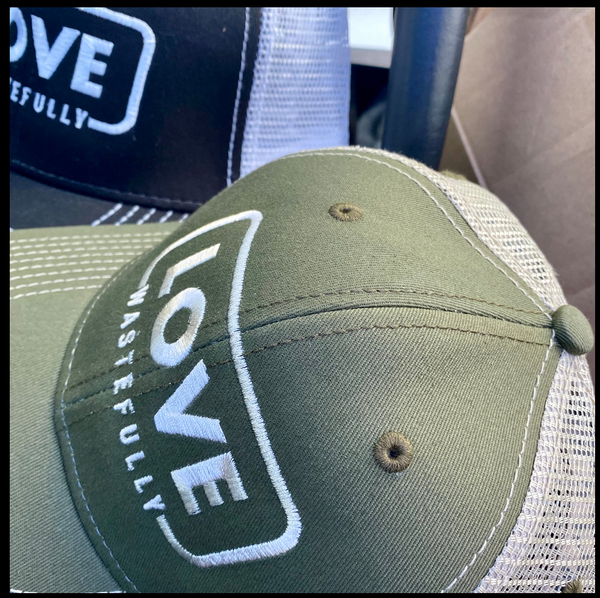 LOVE WASTEFULLY TRUCKER hat